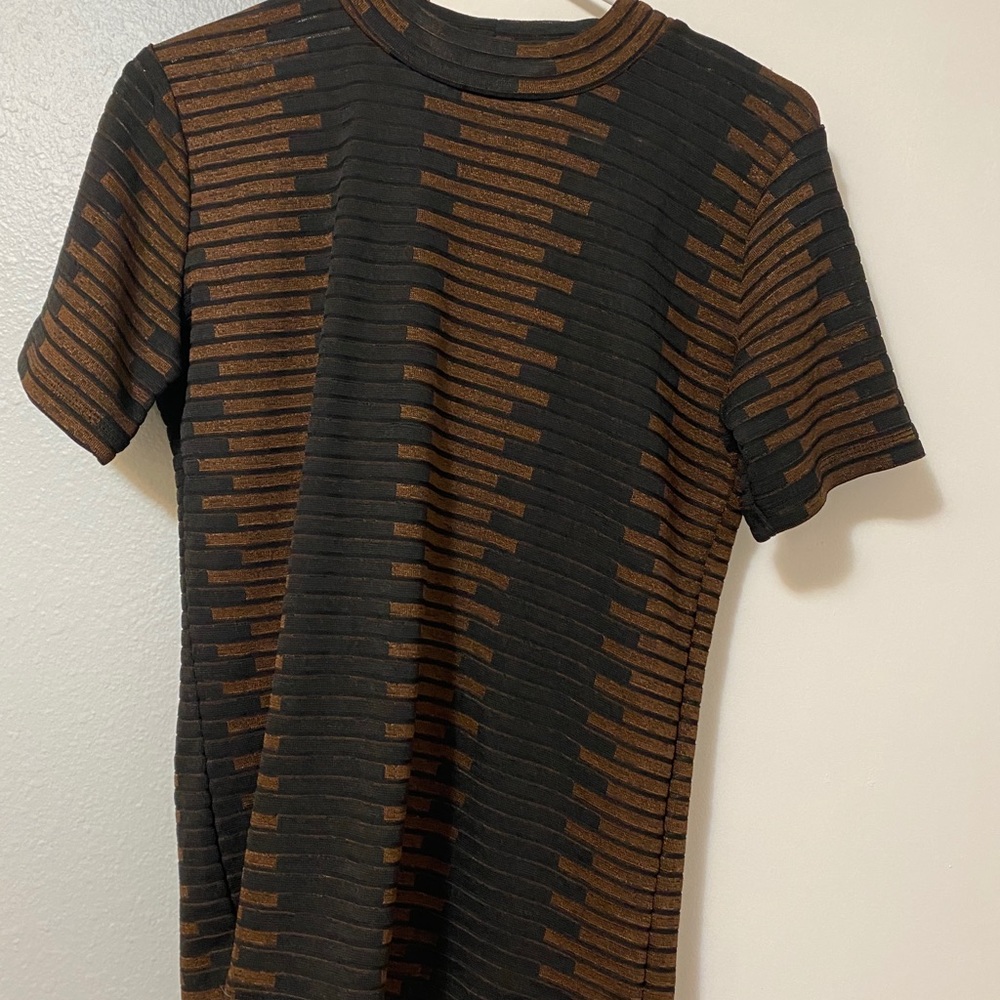 Form fitting shirt perfect for under jackets